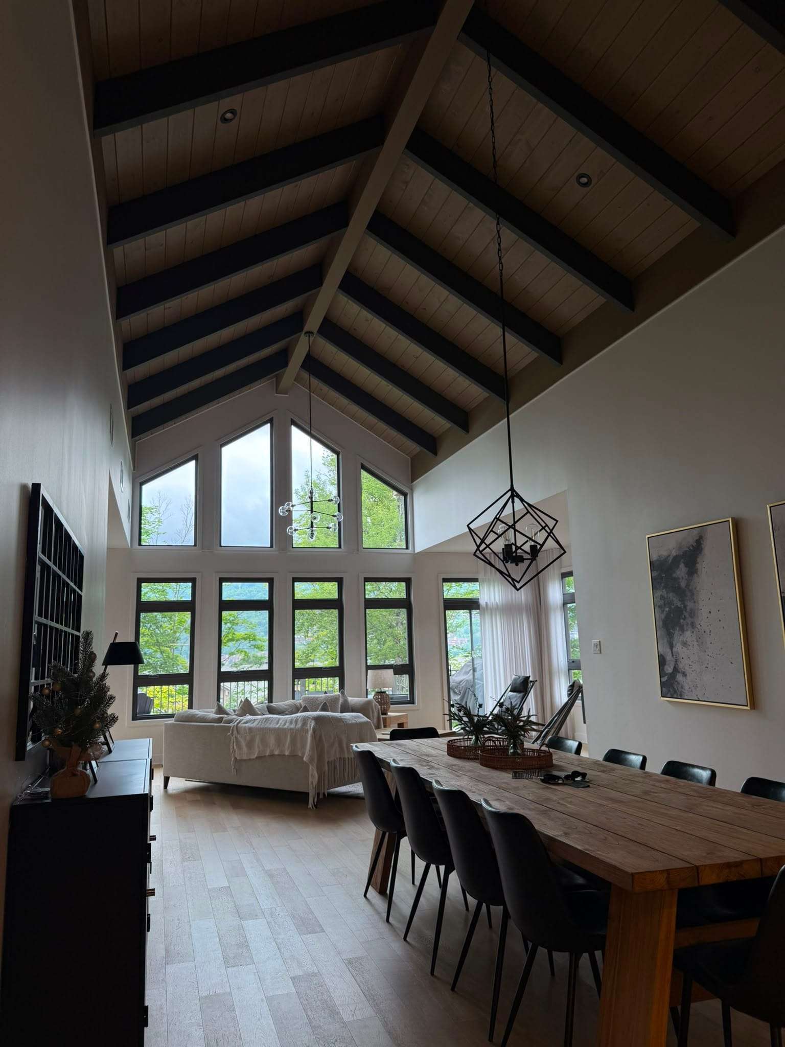 Vaulted great room of a mountain chalet, prepared and ready for guests